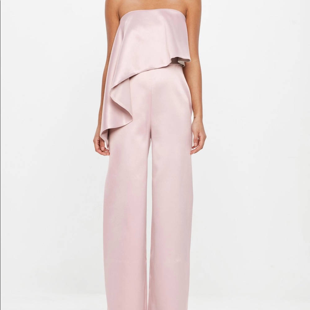 pink jumpsuit with satin fabric and bandeau style